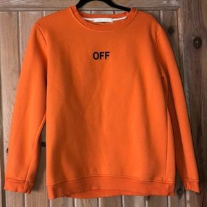 orange and white sweatshirt